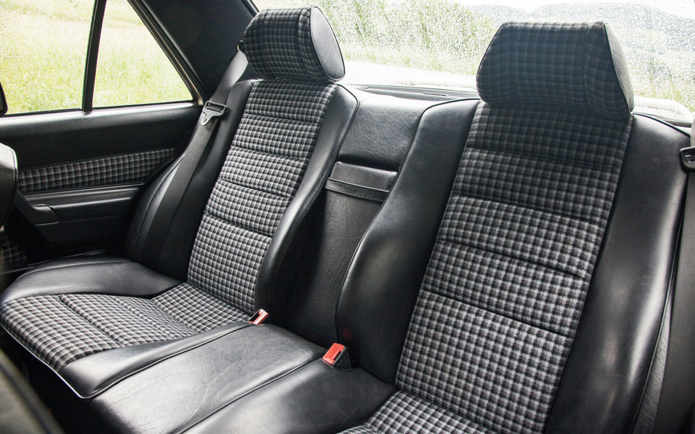mercedes-benz-190e-2-3-16-rear-interior.